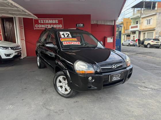 HYUNDAI TUCSON 2.0 MPFI GLS 16V 143CV 2WD GASOLINA 4P AUTOMÁTICO HYUNDAI TUCSON 2.0 MPFI GLS 16V 143CV 2WD GASOLINA 4P AUTOMÁTICO